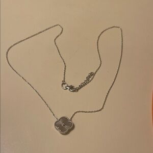 Elegant Silver Necklace with Floral Pendant